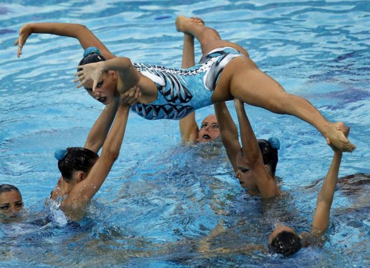 Sync and Swim: A Splash of Hilarity in Synchronized Swimming Snaps