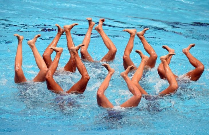 Sync and Swim: A Splash of Hilarity in Synchronized Swimming Snaps